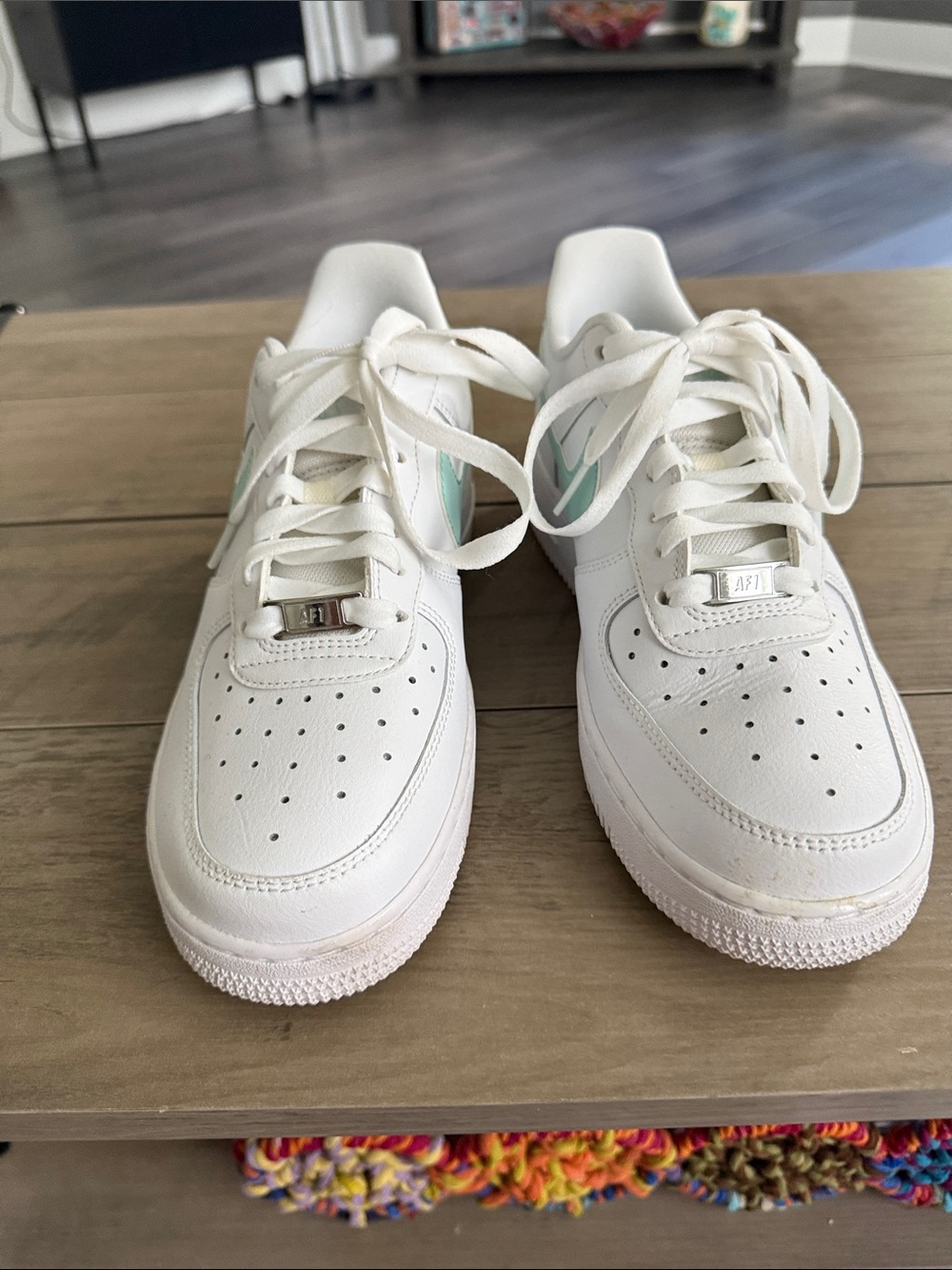 Nike White Sneakers with Mint Swoosh Accent